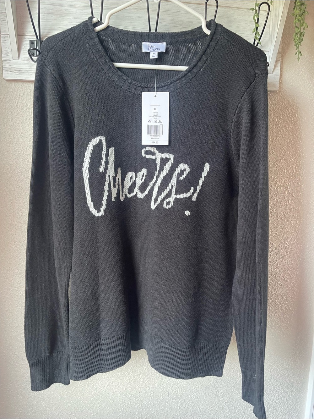Kim Rogers Black Sweater with White "Cheers!" Script